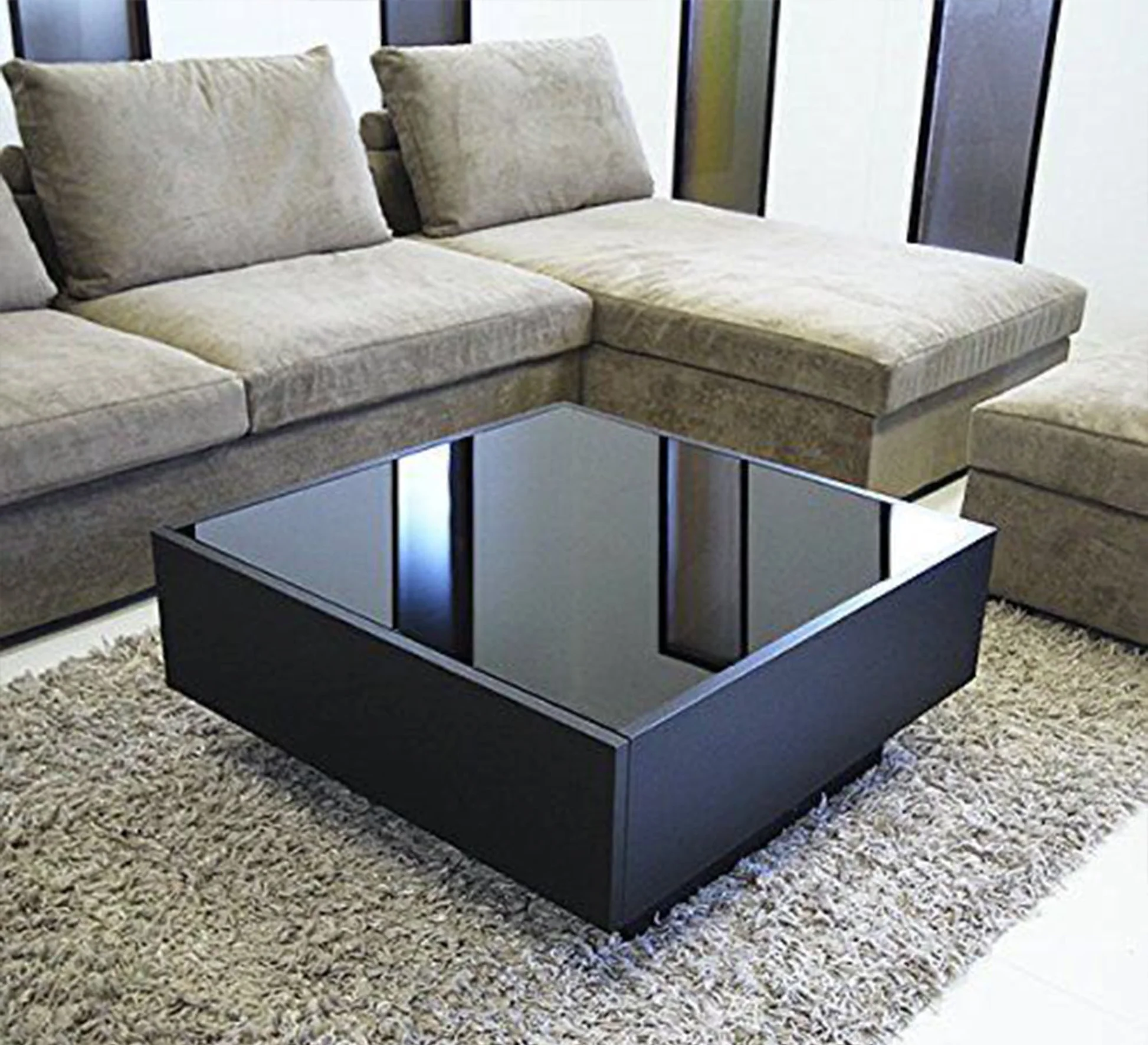 black GS-Boxy coffee table with a glass top.